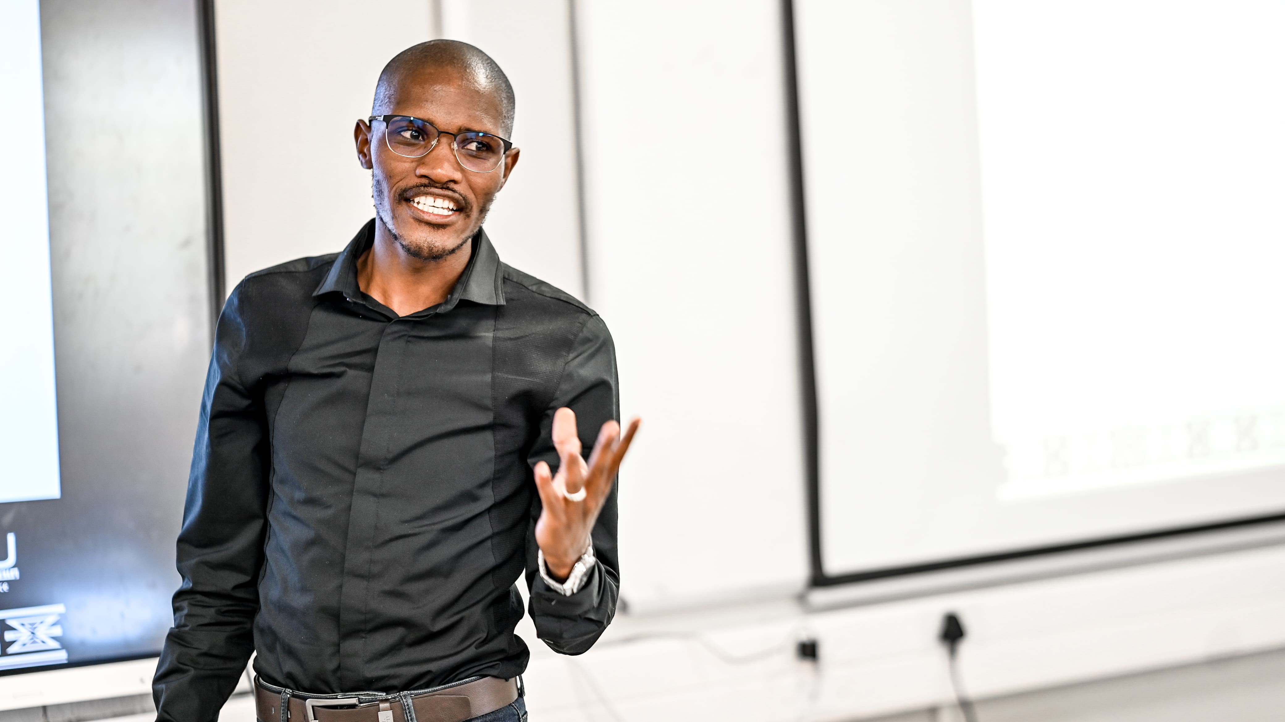 Walter Sisulu University researcher Luvo Kasa delivers a presentation on “Decolonising Cultural Narratives of Ulwaluko in the 21st Century” at the South African Humanities Deans Association (SAHUDA) Conference. DECOLONISING CULTURAL NARRATIVES OF ULWALUKO IN THE 21ST CENTURY