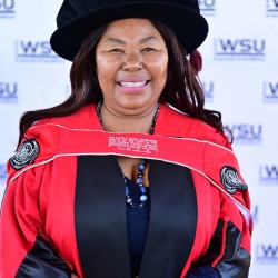 WSU LECTURER RECEIVES DOCTORAL DEGREE AT AGE 64